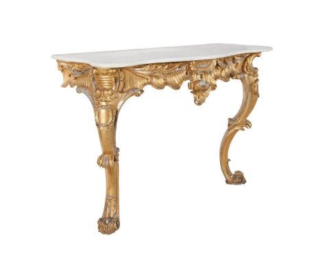 A VICTORIAN GILTWOOD MARBLE TOP CONSOLE TABLE, of serpentine form, the white marble top above carved and pierced scrolling fr