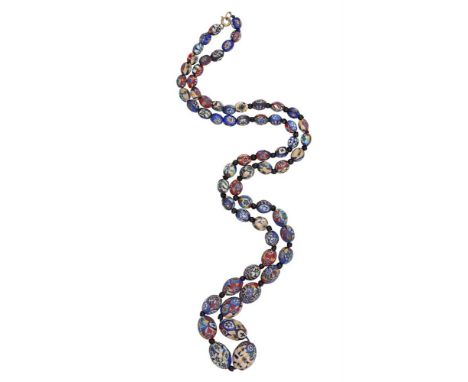 A CERAMIC BEAD NECKLACEThe graduated and colourful ceramic beads, interspersed with smaller plastic beads, length approx. 92c