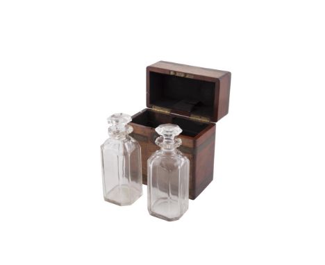AN EARLY 19TH CENTURY BRASS BOUND WALNUT DECANTER CASE, fitted two decanters and stoppers, baise lined interior and with Bram