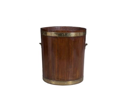 A LARGE IRISH GEORGE III MAHOGANY BRASS BOUND FUEL BUCKET, of coopered construction with twin brass side handles. 76cm high x