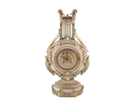 A LATE VICTORIAN ROYAL WORCESTER BLUSH PORCELAIN LYRE CASED MANTLE CLOCK, the gilded dial within a foliate wreath and raised 
