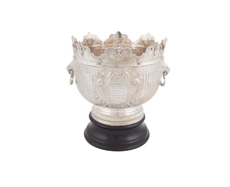 A LARGE VICTORIAN SILVER PRESENTATION MONTEITH, London 1899, maker's mark of Charles Stuart Harris, the wavy raised cast figu