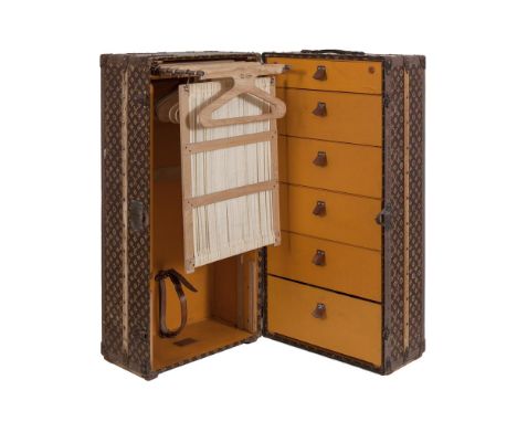 A VINTAGE LOUIS VUITTON STENCIL MONOGRAM DOUBLE WARDROBE STEAMER TRUNK, c.1930, the hinged interior opening to reveal six fit