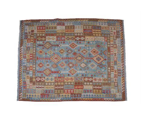 A CONTEMPORARY FLAT WOVEN KILIM CARPET, 20th Century, of rectangular form, decorated with coloured lozenges and geometric pat