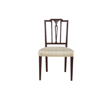 A SHERATON MAHOGANY SIDE CHAIR, the flat arched crest rail above stick splat back with padded seat raised on square tapering 