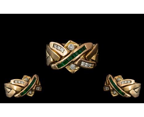 14ct Diamond &amp; Emerald Knot Ring, set with a row of square cut emeralds, princess cut diamonds between two round cut diam