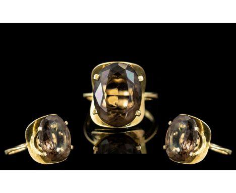 Ladies 9ct Gold Single Stone Smoky Topaz Set Ring. Marked 9ct to Interior of Shank. Est Weight of Topaz 6,00 cts. Ring Size P