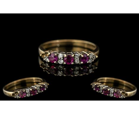 Ladies Attractive 9ct Gold Amethyst and Diamond Set Ring. Fully Hallmarked for 9.375. Ring Size N. Weight 2 grams. 