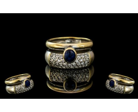 18ct Gold Bespoke Diamond and Sapphire Set Designer Ring, the cabochon cut sapphire of excellent colour, as are the pave set 