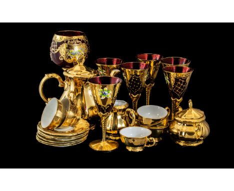 A Gilt Tea Service comprising coffee pot, 6 cups and saucers, sugar bowl and lid and milk jug. Together with a collection of 