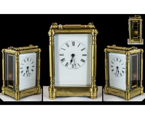 Early 20th Century Large Brass Carriage Clock. Features A White Porcelain Dial, Open Lever Escapement ( Visible ) Glass Panel