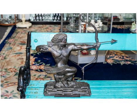 Bronze Art Deco Style Figure of a classical male with a bow, on a square stepped base.  Height 25", length 24".   