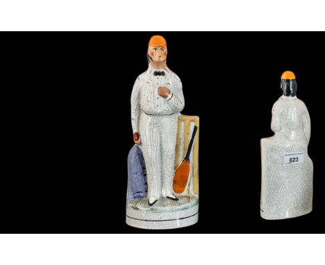 Staffordshire Style Ceramic George Parr Figure of a Cricket Player, measures 10'' tall, in good condition.