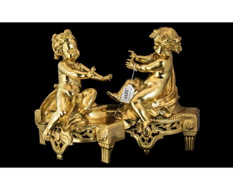 Pair of French Gilt Bronze Statues Depicting Putti, measure 13" tall x 10" wide.  Part garniture set.