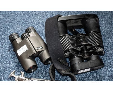 Two Pair of Binoculars with Tripod. 1 Is Tasco. ( 3 ) Items In Total. 