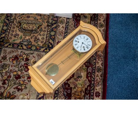 Large Wall Clock In a Light Beech Wood Finish. Approx 26 Inches High, 10 Inches Width &amp; 5 Inches Depth. Maker AMS. Not Te