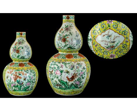An Antique Chinese Double Gourd Vase painted floral enamel decoration with birds, butterflies etc. Height 14 inches. Some hai