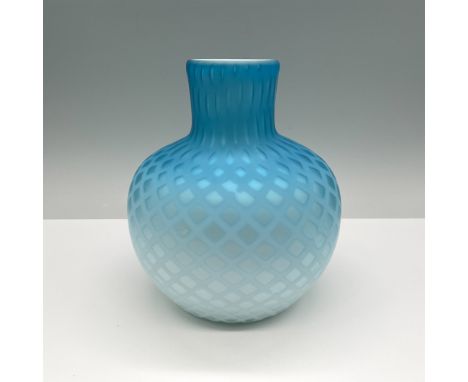 A stunning blue satin art glass vase featuring an elegant diamond quilt pattern. The vase showcases a vibrant gradient from d