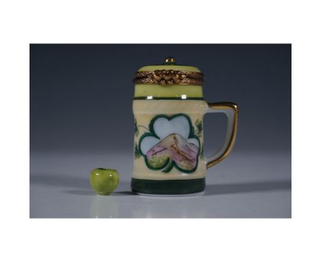Charming Marquise de Pompadour Limoges porcelain box designed as an Irish stein with a green apple inside. This finely crafte