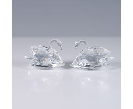 A beautiful Swarovski Silver Crystal swan pair from the "To Cherish" collection. These elegantly designed swans are crafted f