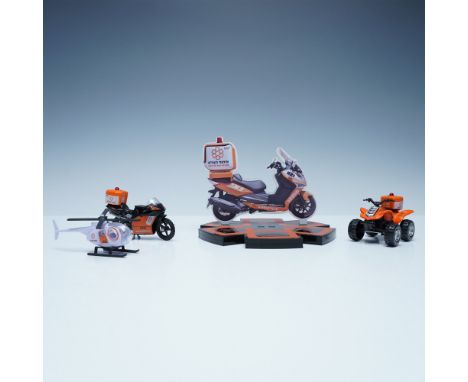 The set comes with a custom-designed display stand featuring a printed image of a full-size United Hatzalah ambucycle. The st
