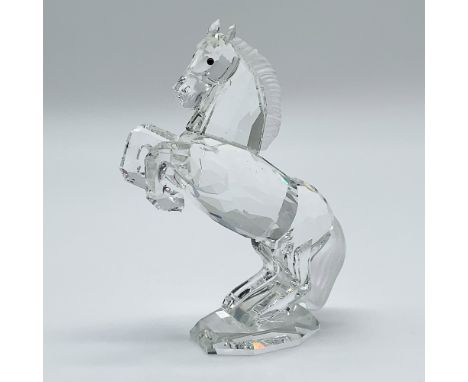 Swarovski Crystal Figurine, White Stallion 174958. This retired Swarovski crystal white stallion was part of the “Horses on P