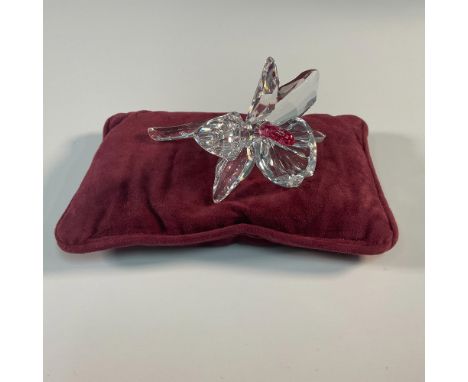 Part of the Exquisite Accents theme group. This exquisite Swarovski crystal figurine features a delicate orchid bloom, adorne