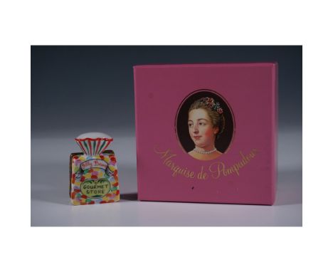 Charming Marquise de Pompadour Limoges porcelain box designed in the shape of a gourmet jelly bean bag. This finely crafted h