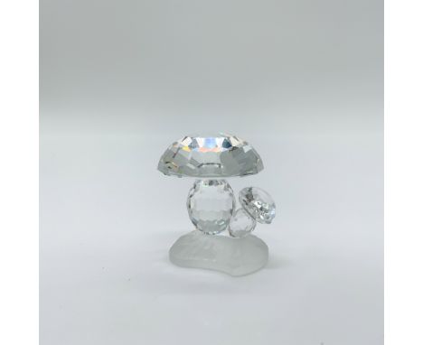 This charming Swarovski crystal mushroom figurine, part of the “Woodland Friends” collection, was designed by Adi Stocker and