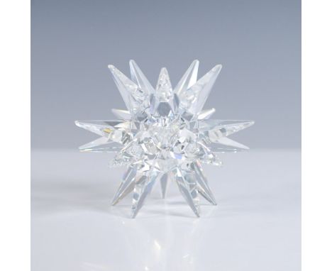 A stunning Swarovski Crystal Star Candleholder, designed to hold one candle. This exquisite piece is part of the "Our Candleh