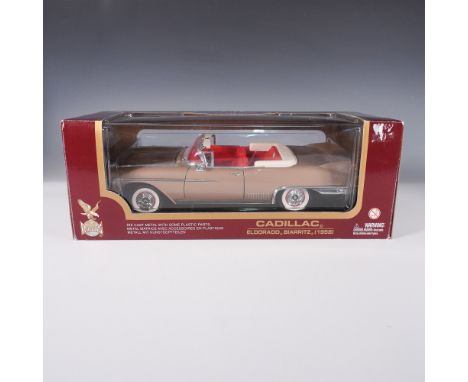 A die-cast metal model of the 1958 Cadillac Eldorado Biarritz, featuring detailed plastic parts including a working steering 