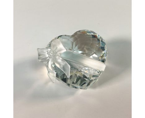 Part of the Exquisite Accent theme group. This Swarovski crystal features a delicate heart-shaped design adorned with a frost