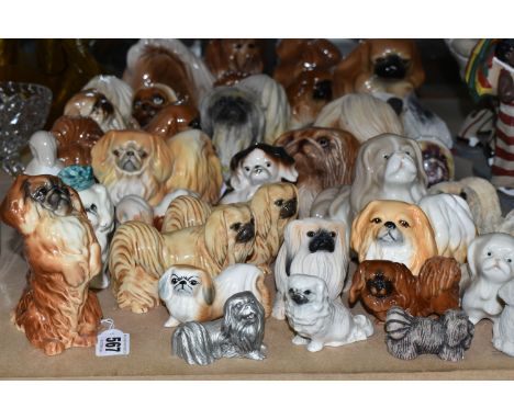 A COLLECTION OF PEKINESE DOG ORNAMENTS, approximately thirty pieces, manufacturers to include Beswick model no 1059, two x Jo