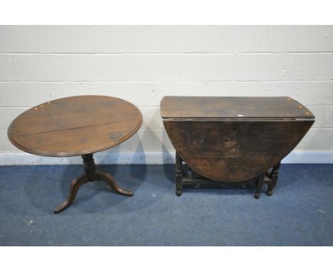 A GEORGIAN OAK OVAL GATE LEG TABLE, with a single leaf, open length 147cm x closed length 44cm x depth 108cm x height 74cm, a