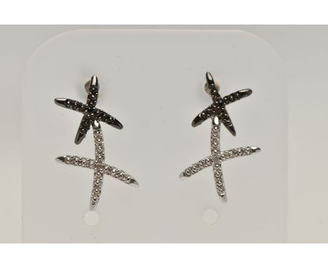A PAIR OF 9CT GOLD DIAMOND SET EARRINGS, each designed as two crosses set with single cut black and colourless diamonds, to t