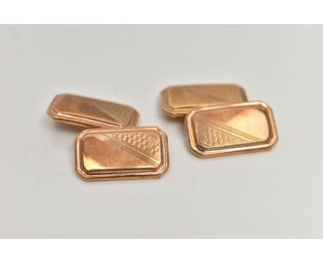 A PAIR OF 9CT GOLD CUFFLINKS, yellow gold rectangular form with cut off edges, engine turned pattern, chain link fittings, ha