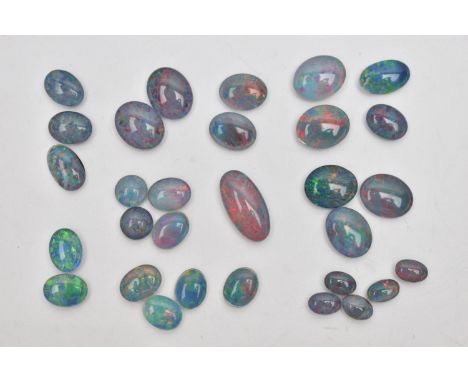 AN ASSORTMENT OF LOOSE OPAL TRIPLETS, thirty oval triplets, varying in size (condition report: unused condition)