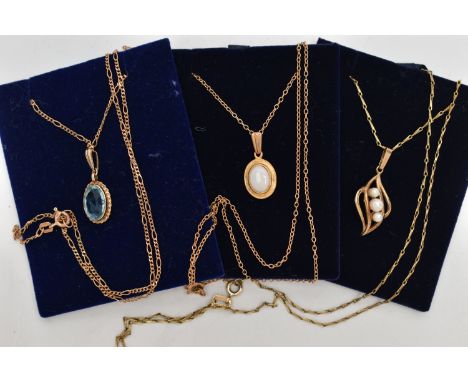 THREE GEM SET NECKLACES, the first an oval cut topaz, collet set in yellow gold with rope surround detail, suspended on a fin