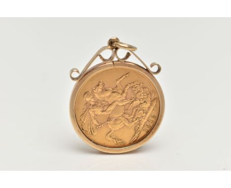 A FULL SOVEREIGN AND MOUNT, sovereign depicting George and the Dragon 1912, King George VI to the obverse, set in a yellow go