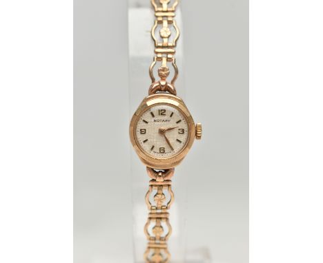 A 9CT GOLD ROTARY WRISTWATCH, hand wound movement, round dial signed 'Rotary', baton and Arabic numerals, inside case back ha