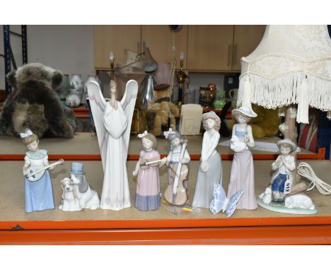 A NAO FIGURAL TABLE LAMP AND A COLLECTION OF NAO FIGURES, comprising a table lamp modelled as a shepherd boy among sheep (mis