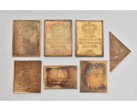 SEVEN COMMEMORATIVE SILVER STAMPS, gilt silver, each with a full silver hallmark for London import, approximate gross weight 