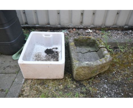 AN ANTIQUE WEATHERED SANDSTONE TROUGH, length 61cm x width 43cm x height 44cm, along with a Belfast sink (condition report: -