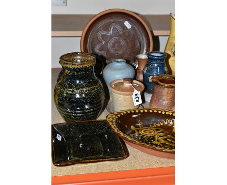 A GROUP OF STUDIO POTTERY PIECES,  comprising a 1970's Jean Hampton slipware pottery oval dish decorated with a stylised fish