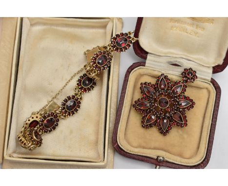 A BOHEMIAN GARNET BROOCH/PENDANT AND A BRACELET, the flower pendant set with circular cut and pear cut garnets, gilt metal mo