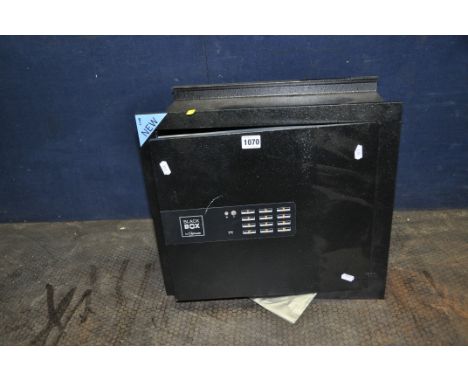 A BLACK BOX BY CHUBB ELECTRONIC WALL SAFE with motorized lock, outside dimensions width 45cm x depth 23cm x height 40cm with 