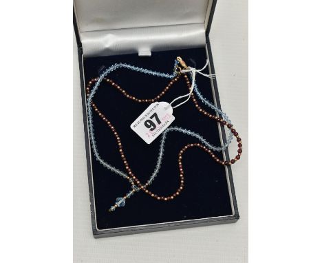 TWO GEM SET NECKLACES, the first desinged as a row of polished circular garnet beads, with yellow metal ball spacers, fitted 
