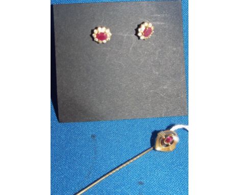 A pair of yellow coloured metal and gemstone cluster stud earrings, and a yellow coloured metal and ruby stick pin (2)