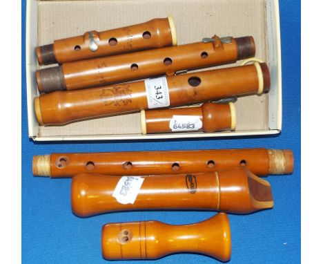 A Wood & Ivy boxwood flute, the mouth piece stamped Wood & Ivy Late Geog Wood New Compton Strt 50 Soho, London, 60.5 cm long,
