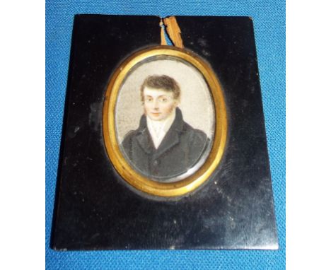 An oval bust portrait miniature, of a gentleman, watercolour, 4 x 3 cm Condition report Report by NG

On ivory.  Surface grub